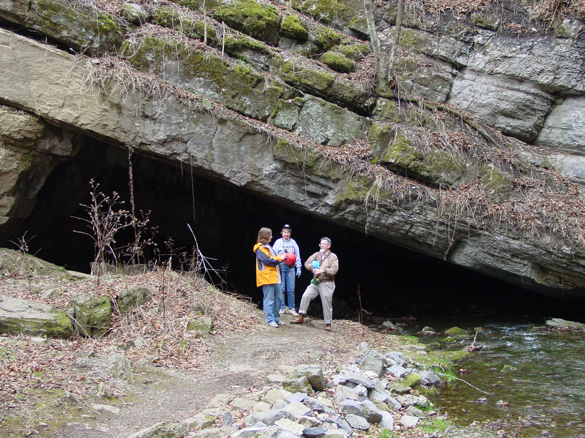 Will and Bet White lead a cave tour. Tytoona cave entrance is a fenster, the underground route of Sinking Creek.  Has been explored to 300 m, about ¼ the distance to Arch Spring.  There are additional siphons.  Can look at sediment in the entrance of the cave